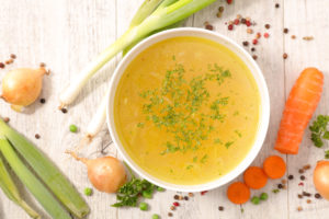 bowl of bone broth with vegetables